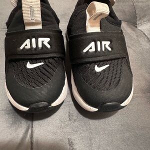 Nike Black and White Slip-On Sneakers with Elastic Strap